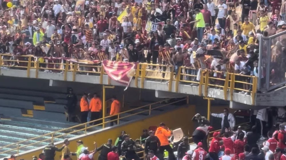 Barra de Santa Fe repudió robo de bandera a 'parche' del DEPORTES TOLIMA, que originó gresca en El Campín: hizo fuerte llamado a los hinchas 'cardenales'